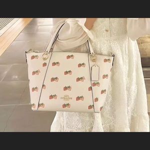 Coach Kasey strawberry print purse